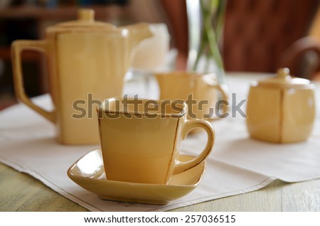 Ceramic coffee set on old table