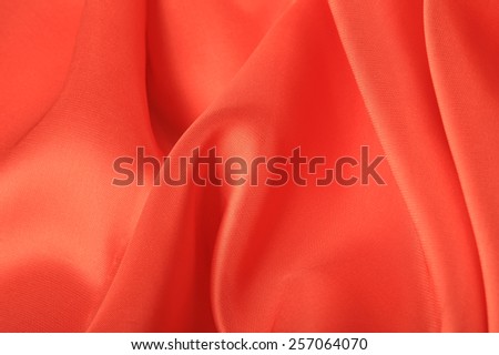 macro texture of satin fabric coral color studio 