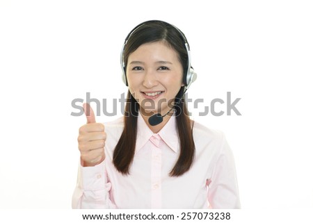 Call center operator showing thumbs up sign