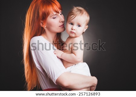 Mom plays with her daughter