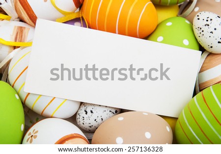 easter background with easter eggs and greeting card