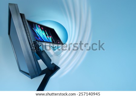 Computer monitor on a blue background
