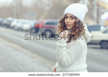 portrait of a beautiful blonde winter outside