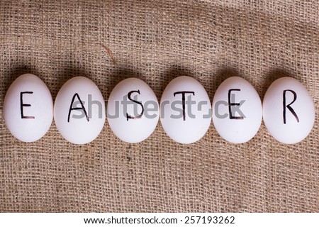 Six eggs with easter in a row