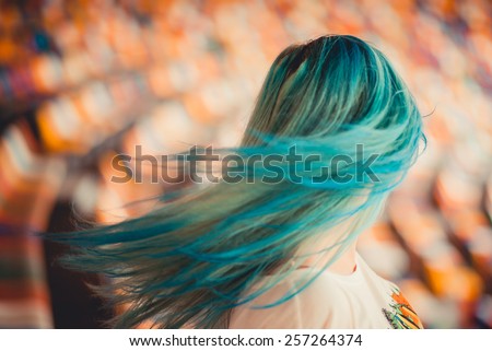 girl with blue hair Royalty-Free Stock Photo #257264374