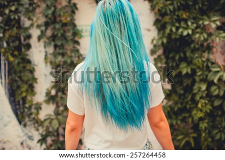 girl with blue hair Royalty-Free Stock Photo #257264458