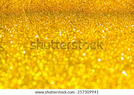 Bokeh gold color abstract background.