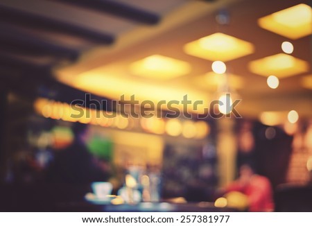 Blurred cafe - retro effect style photo Royalty-Free Stock Photo #257381977