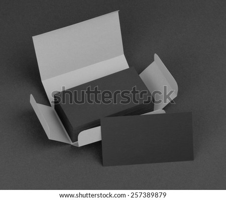 Black business cards in the gray box