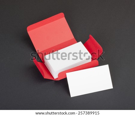 White business cards in the red box