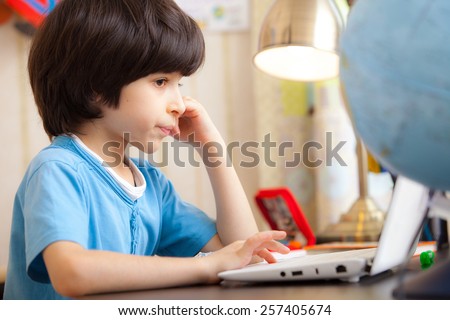 boy with computer, distance learning