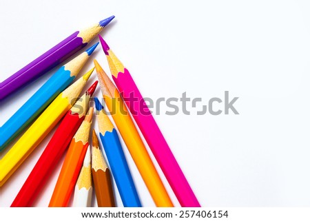 set of colored pencils for drawing on a white background