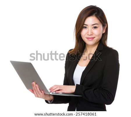 Business woman uses tablet