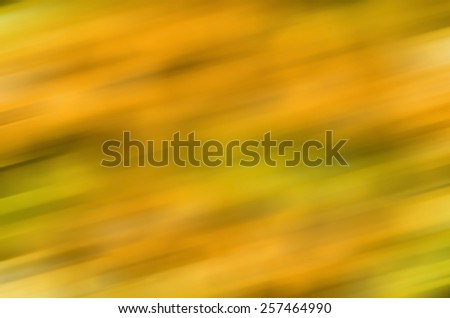 Festive colored glowing abstract circular bokeh yellow green background. Best for greeting card, web  banner.
