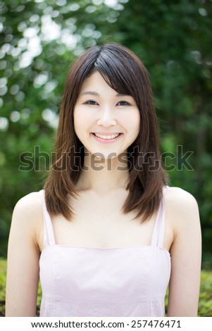 beautiful young woman in a park