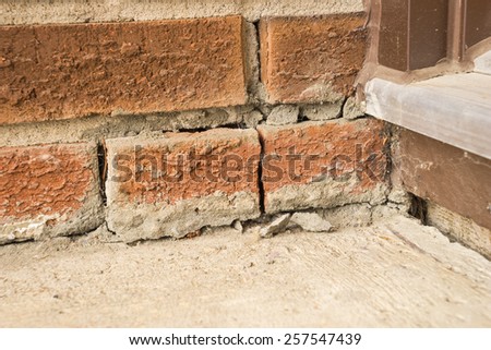 A bricks crack in the house corner