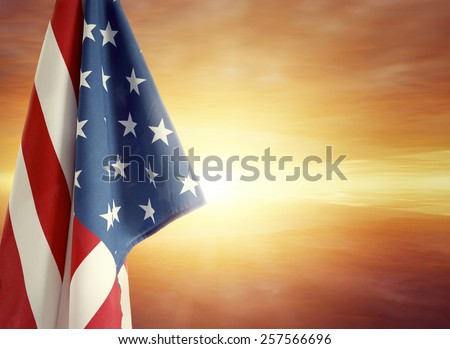 American flag and bright sky