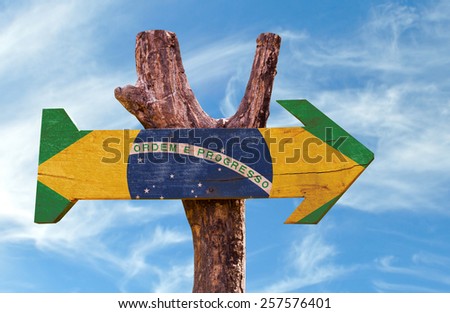 Brazil Flag wooden sign with sky background