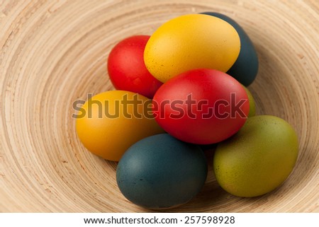 Colorful easter eggs decorated on color background