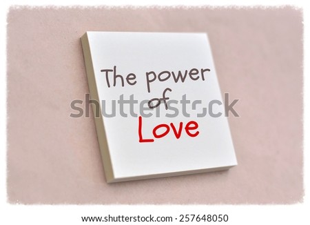 Text the power of love on the short note texture background