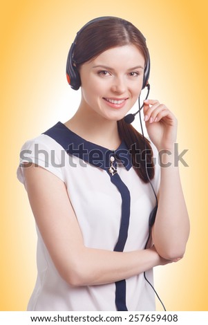 Portrait of happy smiling cheerful young support phone operator