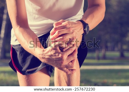 Jogging injury. Warp up before any exercise. Royalty-Free Stock Photo #257672230
