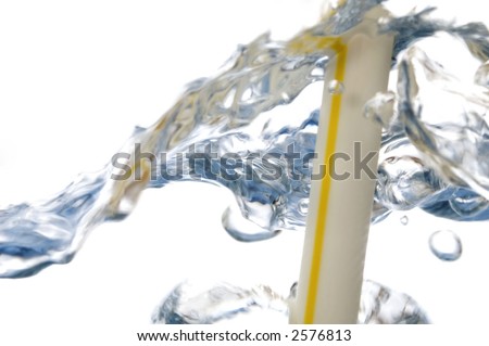 yellow straw and water bubbles isolated on white background