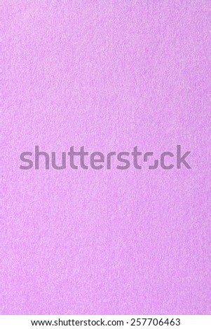 Vertical image of a colored texture. Magenta.
