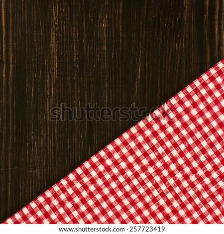 Checkered Tablecloth On The Wooden Table