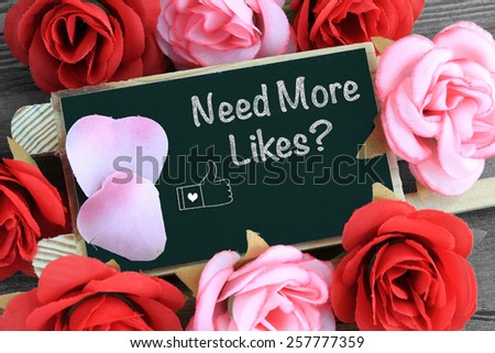 message of need more likes on chalkboard