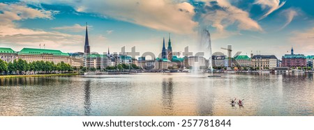 Panoramic view of famous Binnenalster (Inner Alster Lake) in golden evening light at sunset, Hamburg, Germany Royalty-Free Stock Photo #257781844