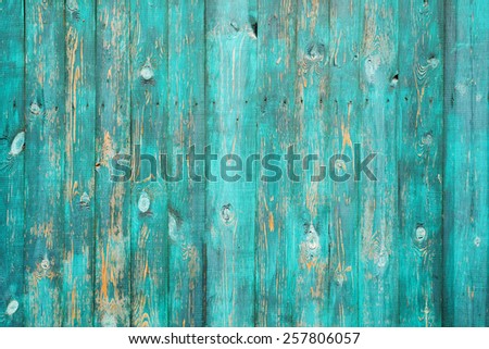 Close-up picture of real wood wall texture. The wall is old and  with peeling paint