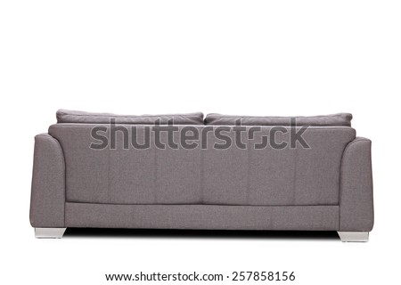 Rear view studio shot of a modern gray sofa isolated on white background Royalty-Free Stock Photo #257858156