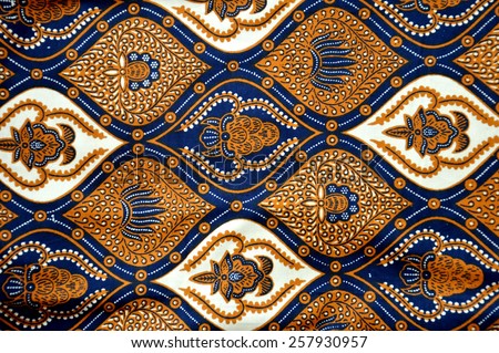 detailed patterns of Indonesia batik cloth Royalty-Free Stock Photo #257930957