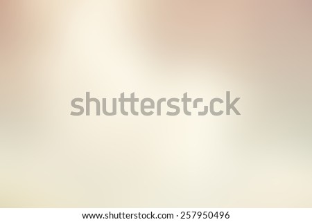 abstract background of white silver and gold blurred lights. 