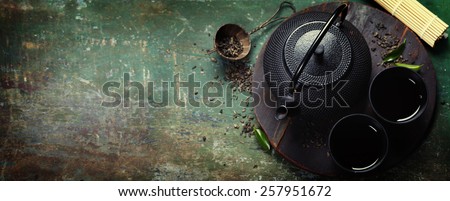 Black iron asian tea set,vintage style Royalty-Free Stock Photo #257951672