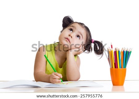 dreamy child girl with pencils isolated on white Royalty-Free Stock Photo #257955776