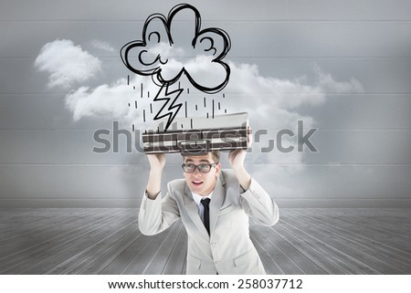 Geeky businessman holding his briefcase over head against clouds in a room