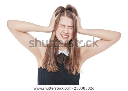 Young teenage girl with headache isolated on white background