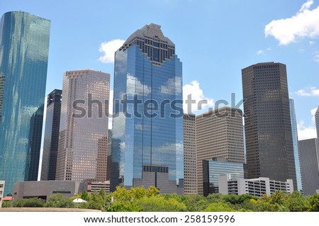 Houston Texas skyline with a bright blue sky