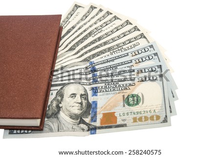 USA One hundred dollar bills  keep in notebook isolated on white background