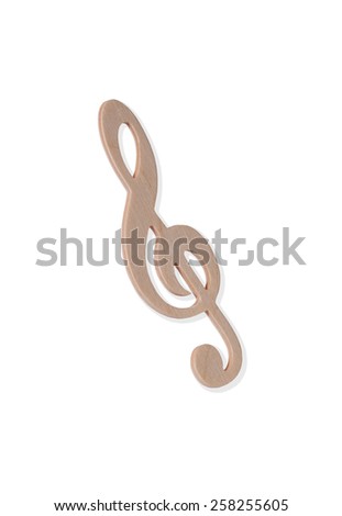 wooden treble clef on white background
