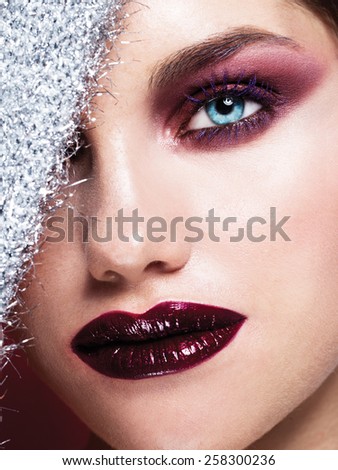 Blue Eyes Closeup.Beautiful Fashion Girl with Arrow Make up. Closeup Female eye with Beautiful Fashion bright makeup 