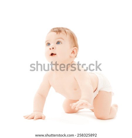 bright picture of crawling curious baby over white backgroubd