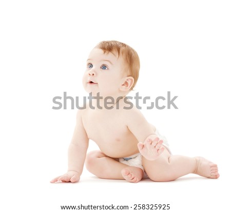 bright picture of crawling curious baby over white backgroubd