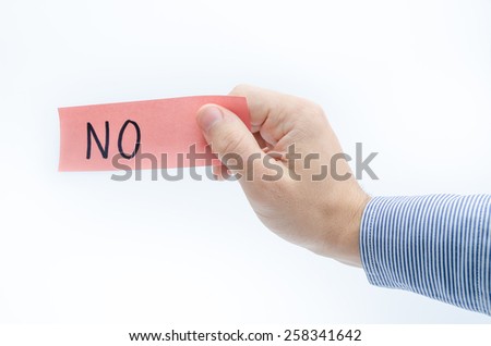 No or refuse something suggested by a man holding a red piece of paper with NO written on it