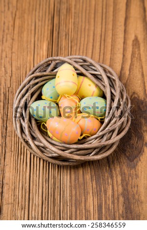 Colorful Easter Eggs on wooden table, Easter background, Easter card, wooden background