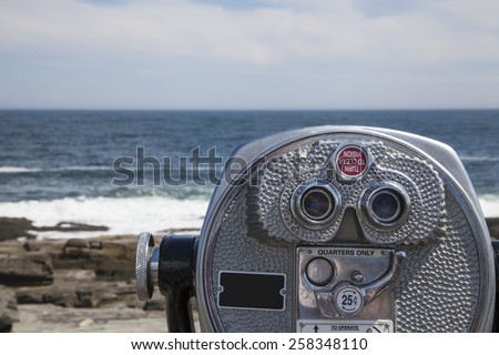 Coin Operated Binoculars Looking Over Ocean