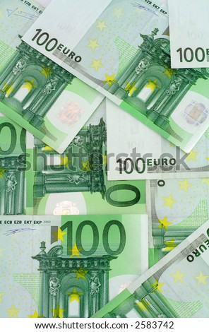 Green background made of banknotes of one hundred euros