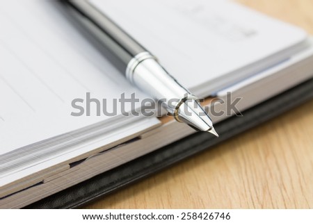 Fountain pen in a notebook